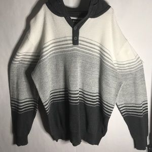 Black, white and gray knit sweater.